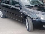 Mitsubishi Lancer 2005 годаүшін3 100 000 тг. в Жезказган – фото 3