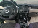 Renault Logan 2012 года за 1 100 000 тг. в Темиртау – фото 5
